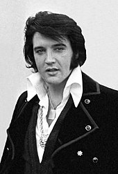 "King of Rock and Roll" Elvis Presley achieved his first number one country album with Aloha from Hawaii Via Satellite. Elvis Presley 1970-2.jpg
