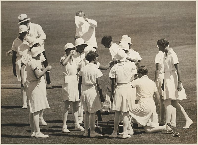 File:English women's cricket team taking a drinking break on the field, 1934-35 (16618497045).jpg