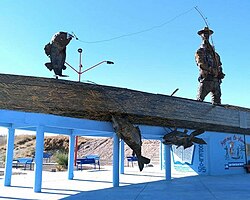 Escultura del pescador en Lago Colina.jpg