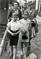 Ewa Kracowska and family walk down a street in Bialystok.jpg