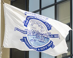Fall River municipal flag over City Hall Flag of Fall River Massachusetts (cropped).jpg