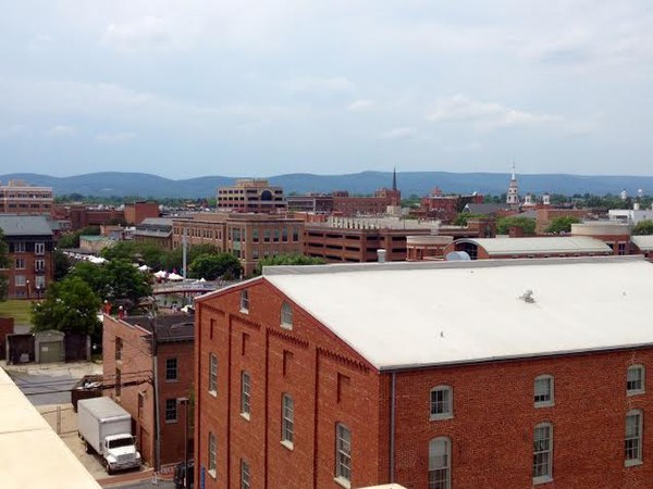 Downtown Frederick with the Blue Ridge Mountains in the distance in June 2014