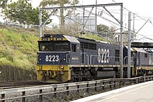 An 82 class locomotive leads a goods train Goods train - panoramio.jpg