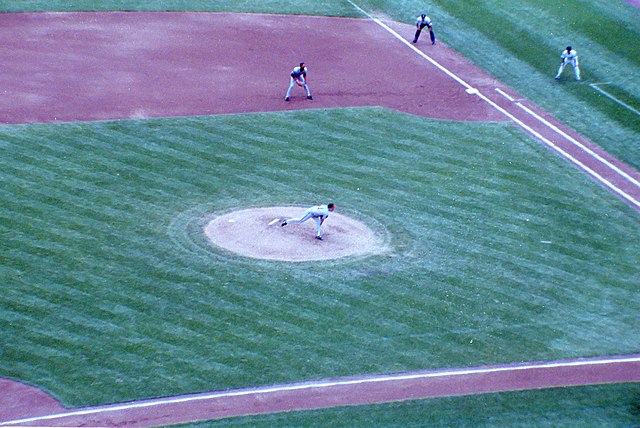 Greg Maddux pitching for the Atlanta Braves at Mile High Stadium in the final game of the 1994 season