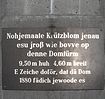 Kölsche Inschrift an der Nachbildung der Kreuzblume vor dem Kölner Dom