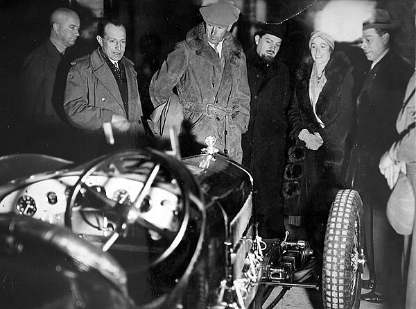 Visit to Alfa Romeo by the marquess (third from left), Italo Balbo (fourth), Lady Cholmondeley (fifth), Prospero Gianferrari (sixth), c. 1930