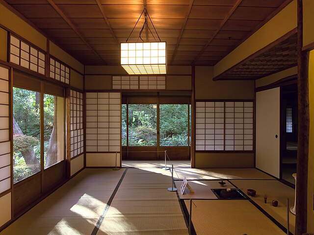 Shōji are modernly placed behind garasu-do