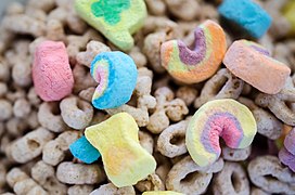 Lucky Charms brand cereal topped with colorful dehydrated marshmallows