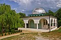 Enclosed turbe, domed with a columns.