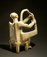 Marble seated harp player MET gr47.100.1.AV1.jpg