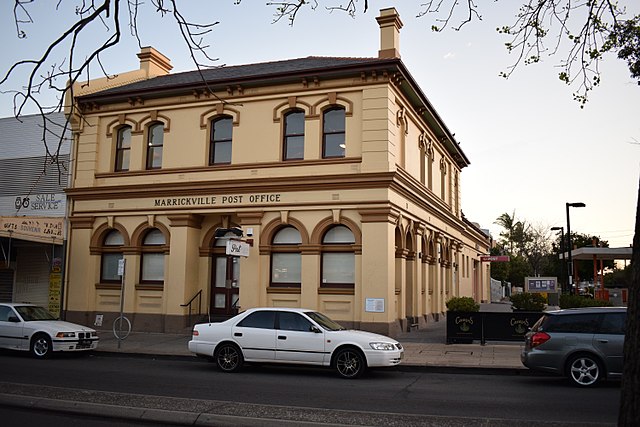View of the Marrickville Post Office from Marrickville Road. The modern post office can be seen to the rear of the building. The front of the building