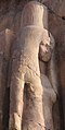 Тия. Фрагмент статуи из заупокойного храма её мужа Аменхотепа III в Фивах, известной как «Колоссы Мемнона».