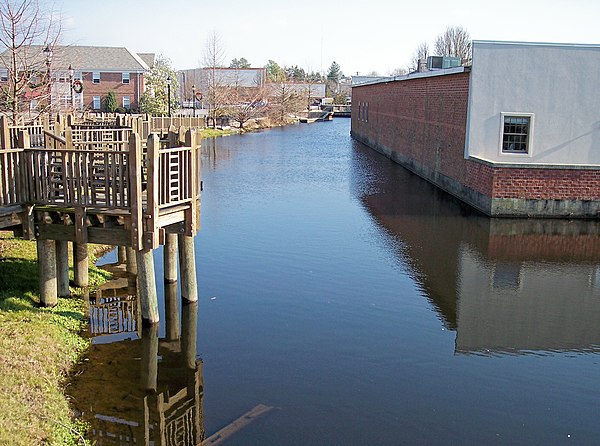 A pedestrian boardwalk parallels the Mispillion River in Milford