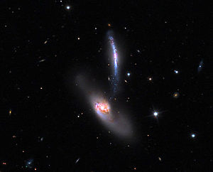 The galaxies NGC 2798 (right) and NGC 2799 (left) captured by the 81 cm reflecting telescope of the Mount Lemmon Observatory.