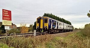 Northern Class 150-2 at Brind Crossing, heading west (geograph 5600655).jpg