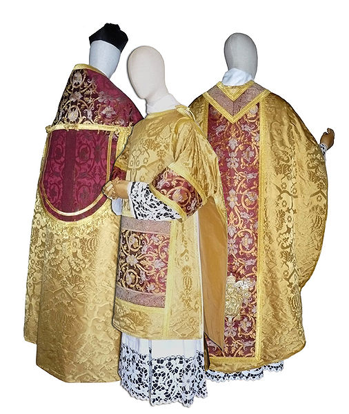 Ornate vestments which are used by the Catholic clergy: A chasuble, dalmatic, cope, and a biretta