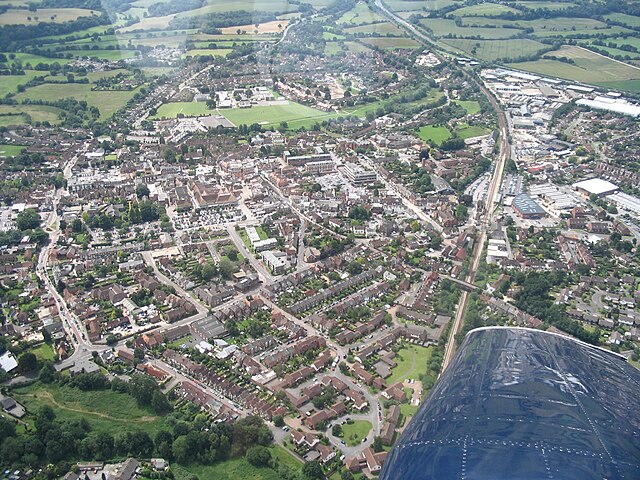 Aerial view from NE with railway (r) and College St (l)