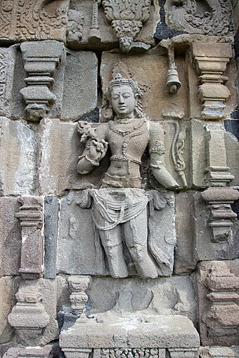 A 9th-century bodhisattva bas-relief. The character of Phil Connors has been interpreted as a bodhisattva: someone who helps others reach nirvana.