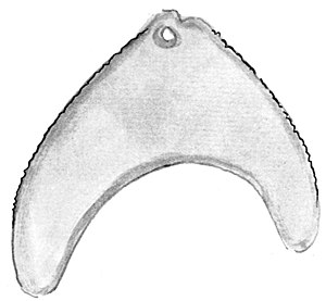 A carved greenstone pendantin a crescent shape with a hole at the top to put a flax cord through.