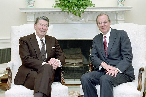 President Reagan and Kennedy meeting in the Oval Office on November 11, 1987