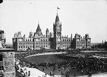 The original Centre Block building in 1897. The building was later destroyed as a result of a fire in 1916. Queen Victoria's Diamond Jubilee on Parliamant Hill.jpg