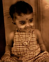 Rekha as a child,1950s. She was born to Gemini Ganesan and Pushpavalli,both were South Indian actors Rekha as an infant.png