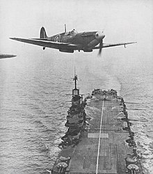 Seafire over Invincible-class NAN2-1-44.jpg