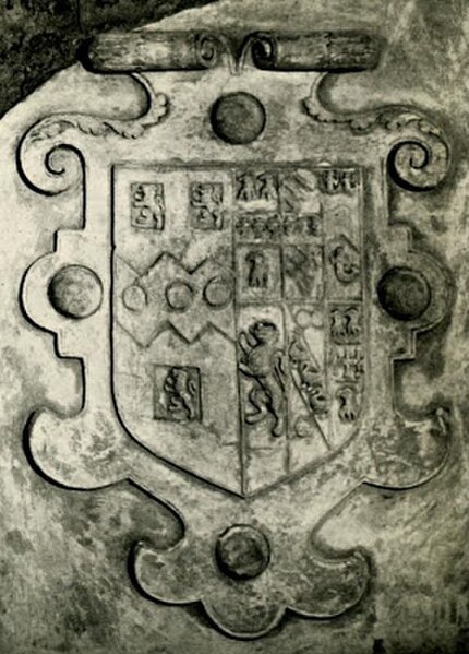 1602 escutcheon within a strapwork surround, showing the arms of Sir Henry Rolle (1545–1625) impaling Watts, of 6 quarters, the family of his first wi