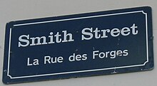 Many street names in St. Peter Port are in English and French Smith Street sign St Peter Port Guernsey.jpg