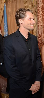 Record producer Toby Gad (pictured) has written four songs for Lovato, including "Skyscraper". TobyGad2013.jpg