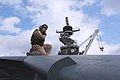 U.S. Marine Corps Cpl. Christopher Melancon adjusts his safety helmet before inspecting an AV-8B Harrier II aircraft assigned to Marine Medium Tiltrotor Squadron (VMM) 266 aboard the amphibious assault ship USS 130314-N-XJ788-065.jpg
