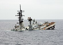The former USS Towers (DDG-9) sinking after being used as a target ship USS Towers (DDG-9) sinking Pacific Ocean after being used as a target, 9 October 2002 (021009-N-8590B-005).jpg
