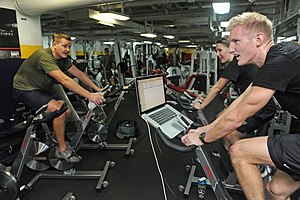 US Navy 120124-N-EK905-074 Sailors participate in a spin class in the gym aboard the amphibious assault ship USS Makin Island (LHD 8).jpg