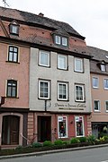 Residential and commercial building and baroque portal