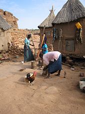 Dogon women pounding millet Women pounding millet in Dogon country.jpg