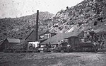 (2.16) Gilpin Tram, Shay No 1 with work train in front of the Meade Mill.jpg