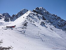 Shymbulak ski resort in Almaty Verkhniaia tochka gornolyzhnoi trassy kurorta Chimbulak..JPG