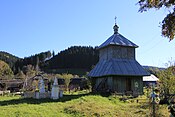 Дерев'яна церква Св. Дмитра 1877р. Стара дзвіниця.
