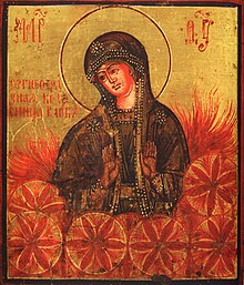 The Fiery Chariot of the Word--19th-century Russian icon of the Theotokos as Ognyena Maria ("Fiery Mary"), fire goddess sister of Perun, and a glaring example of Slavic religious themes in Christianised fashion. Belief in a mother goddess as receptacle of life, Mat Syra Zemlya ("Damp Mother Earth"), was preserved in Russian folk religion up to the 20th century, often disguised as the Virgin Mary of Christianity. The fiery "six-petaled roses" that surround the Ognyena are one of the variants of the whirling symbol of the supreme God (Rod). Ikona Bogoroditsy <<Ognevidnaia kolesnitsa Slova>> .jpg