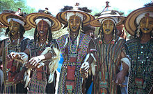 Young Wodaabe men performing a traditional Yaake dance, northern Niger, 1997. 1997 276-18A Yaake demonstration.jpg