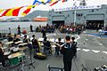 A band plays aboard ROKS Yulgok Yi I during the 70th Anniversary of founding Republic of Korea Navy on 10 November 2015.