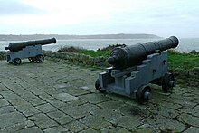 Two cannon on a militia battery, overlooking L'Eree Bay, Guernsey 2 cannon on Militia artillery battery, L'Eree, Guernsey.jpg