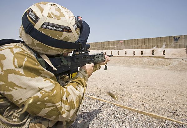 A British soldier aims on a shooting range in Iraq, 29 July 2006.