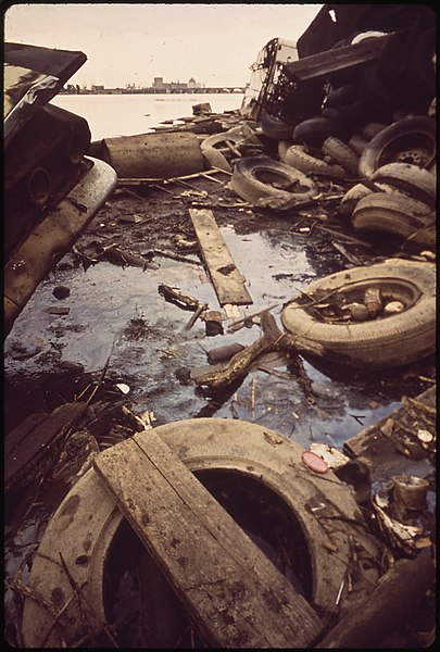 File:A STORM SEWER DRAINAGE LINE LEADS INTO THE MIDDLE BRANCH OF BALTIMORE HARBOR. THE OLD TIRES AND TRASH ARE FROM A... - NARA - 546913.jpg