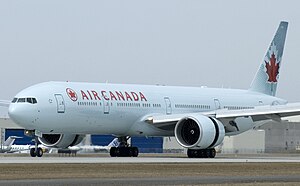 Air Canada B777-333ER (C-FITL) landing at Montréal-Trudeau International Airport.jpg