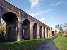 The viaduct from the east, with Waterfall Road on the right Arnos Park Viaduct 25 Nov 2011.jpg