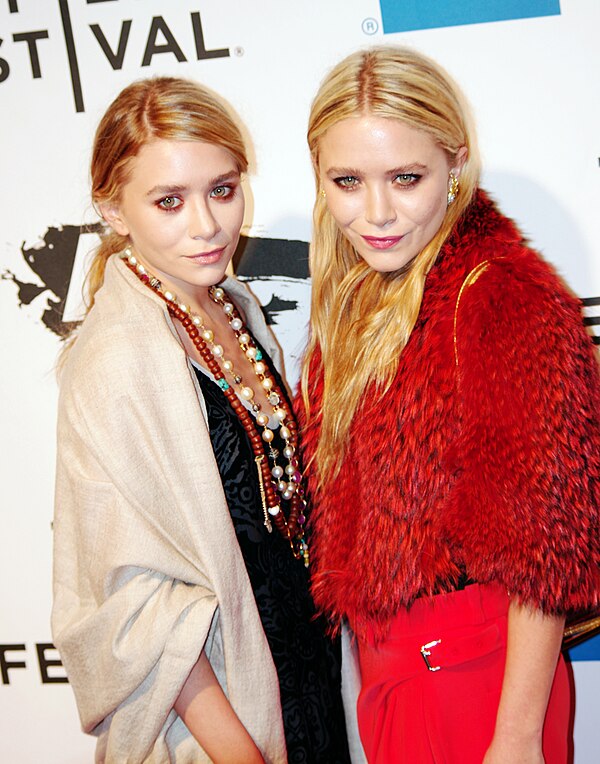 Olsen (left) with twin sister Mary-Kate Olsen at the Tribeca Film Festival 2011