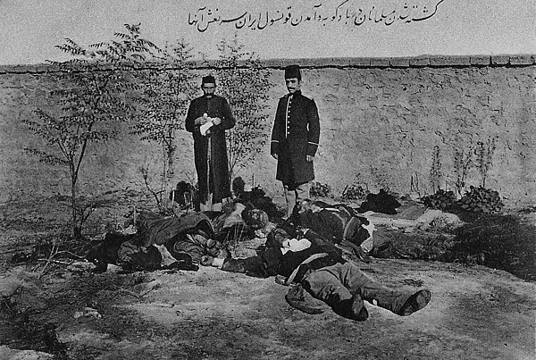 Postcard from Iran. Iranian consul M.S. Vezare-Maragai near Muslim victims in Baku after March days