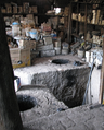Underground pits in which cured barro negro pottery is fired in San Bartolo Coyotepec, OAX, MX.