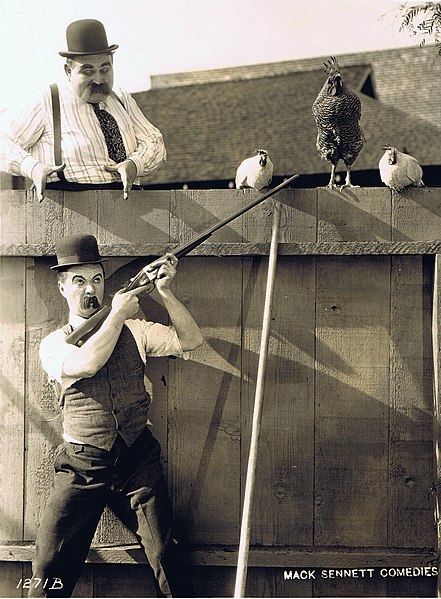 Scene from Oh! Daddy!, featuring Billy Bevan (bottom) and Mildred June (not shown), 1922